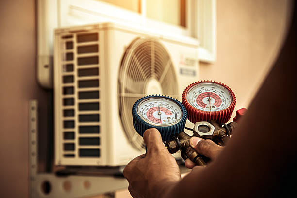 Professional Hvac technician working in Greenfield Center, NY